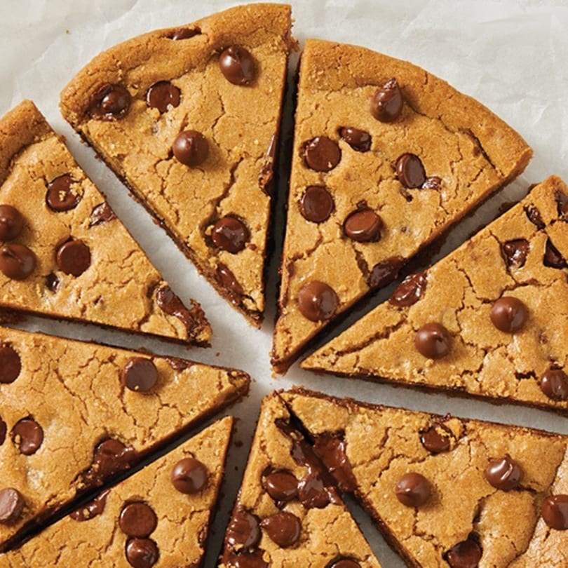 A sliced chocolate chip cookie pizza from Philly's Best Pizza & Subs.