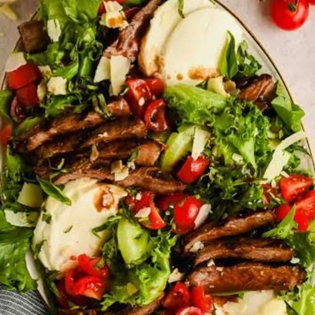 Steak Over Salad.